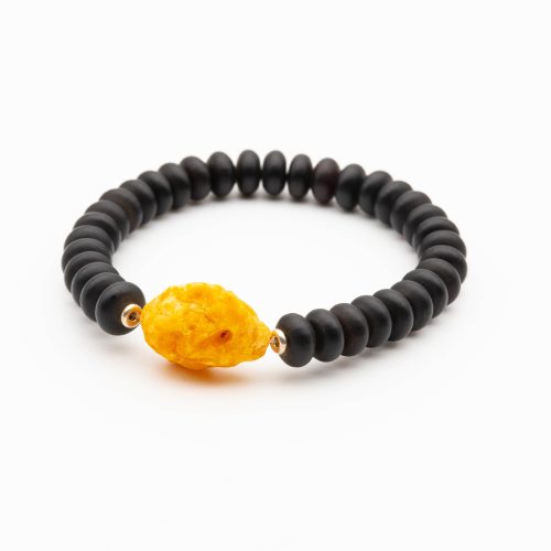 Luxury matte black amber bracelet for men decorated with one larger piece of amber